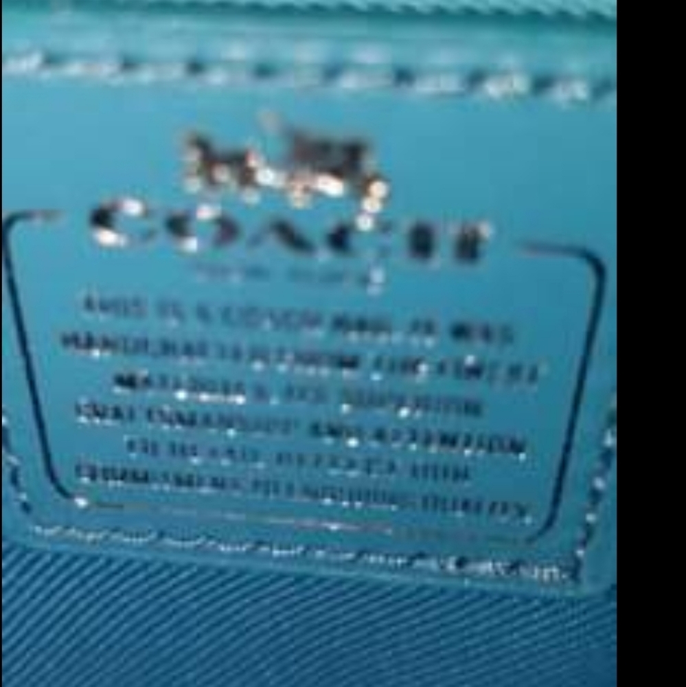 Authentic coach crossbody/wrist clutch